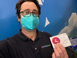 OT/Owner Chris shows off his COVID-19 vaccination card with 2 doses!