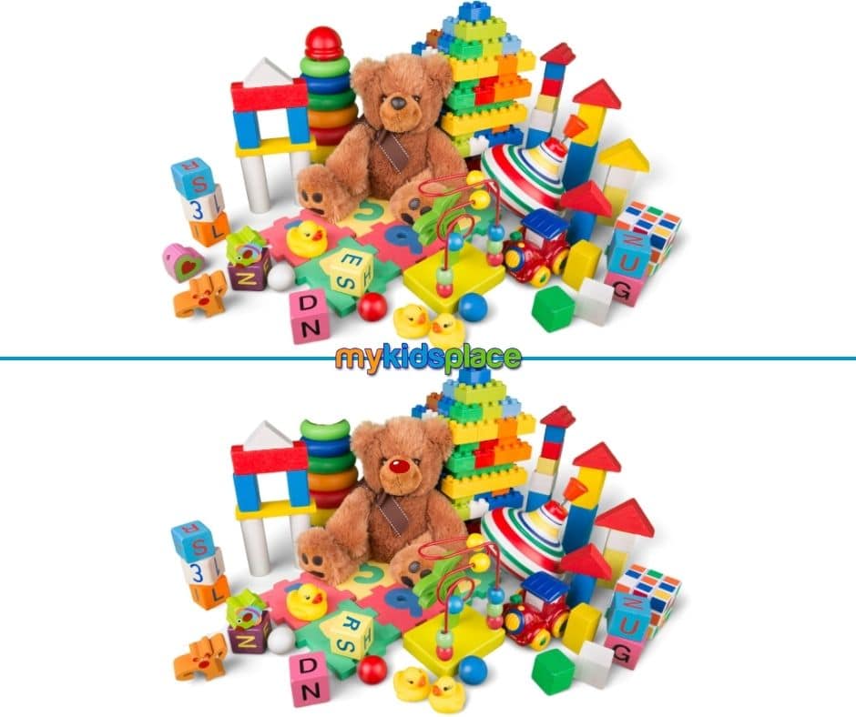 Two nearly identical pictures of a pile of toys are arranged one above the other, separated by a line. The images have 5 subtle differences for the viewer to find.